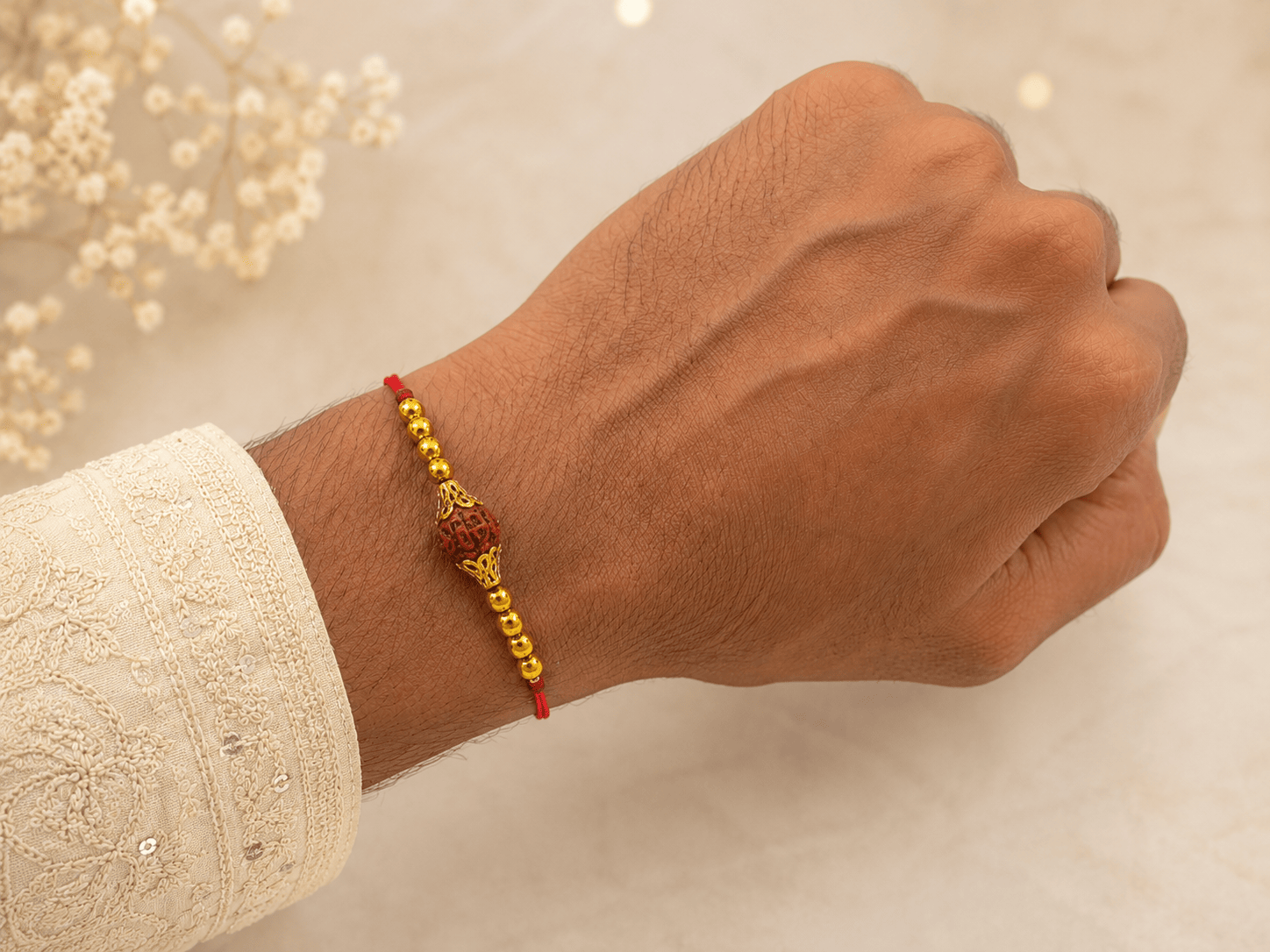 Divine Rudraksha Gold Bead Rakhi1 Divine Rudraksha Gold Bead Rakhi